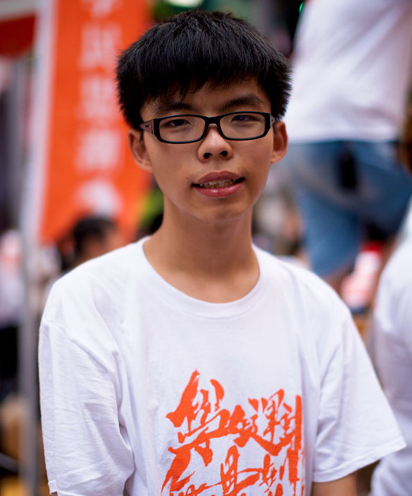 馬英九的「香港危險」論，原本是要向蔡英文射冷箭，卻刺痛了香港人的心。香港學運領袖黃之鋒（圖）便直批馬在講風涼話。(Wiki, 西鐵頭等, 20160617)