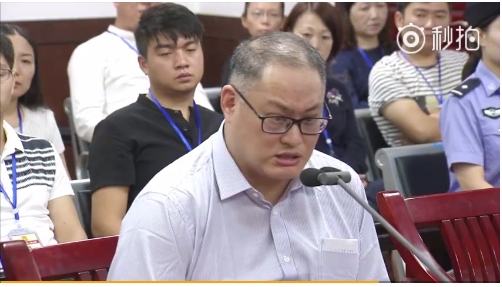 台灣NGO工作者李明哲遭中國當局逮捕、判刑五年，14日服刑期滿出獄，圖為他在大陸法院受審懂形。圖／民報資料庫擷取自微博