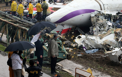復興航空班機墜基隆河造成嚴重傷亡,引發各界再關注松山機場遷移議題,因為松山機場在市中心,一旦發生意外,對人命安全將無法預測。(中央社資料照片)