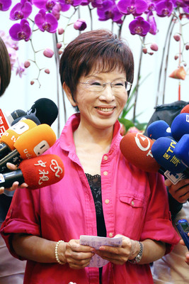 洪秀柱抗拒訪美,國民黨高層不同調。(圖:中央社)